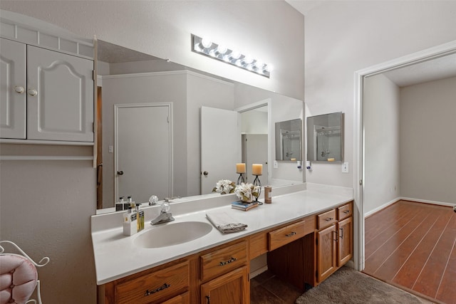 3310 Country Meadows Ct, Pearland, TX 77584 - bathroom featuring vanity and wood finished floors