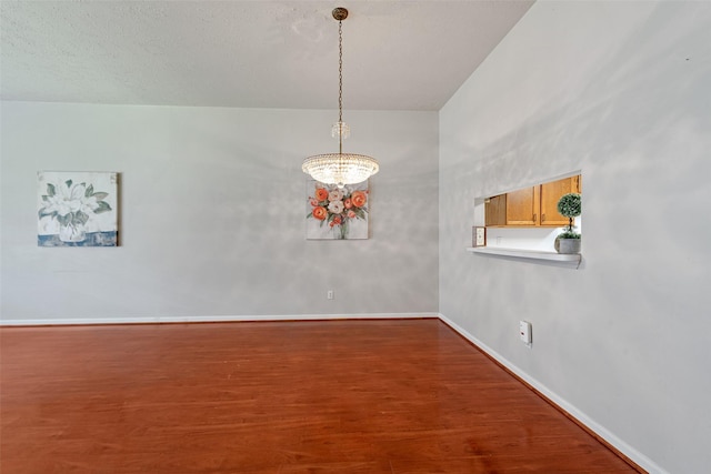 3310 Country Meadows Ct, Pearland, TX 77584 - unfurnished room with a chandelier and wood finished floors