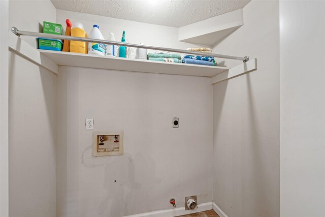 3310 Country Meadows Ct, Pearland, TX 77584 - washroom with washer hookup, electric dryer hookup, gas dryer hookup, and a textured ceiling