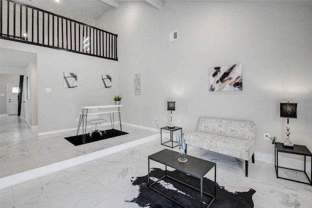 12102 Benmore Dr, Houston, TX 77099 - living room with marble tiled flooring, high vaulted ceiling, and beam ceiling