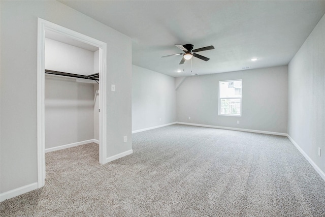 12102 Benmore Dr, Houston, TX 77099 - unfurnished bedroom with carpet floors, a spacious closet, a ceiling fan, and recessed lighting