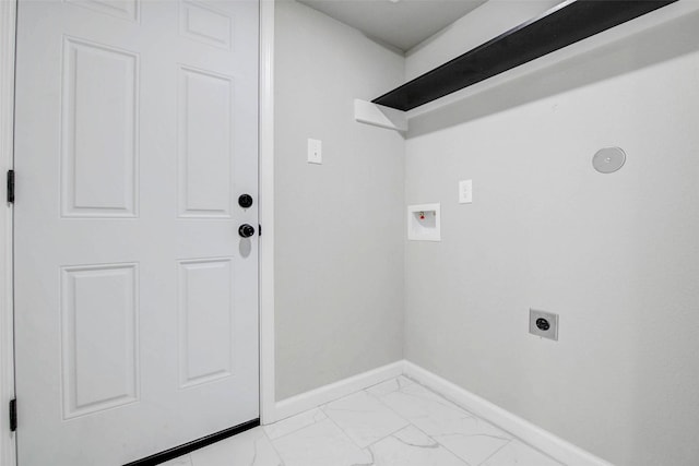 12102 Benmore Dr, Houston, TX 77099 - laundry room featuring electric dryer hookup, light marble finish floors, and hookup for a washing machine