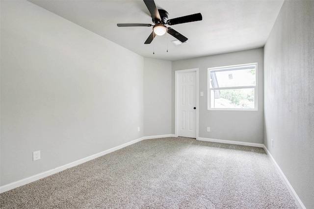 12102 Benmore Dr, Houston, TX 77099 - carpeted empty room featuring a ceiling fan and baseboards