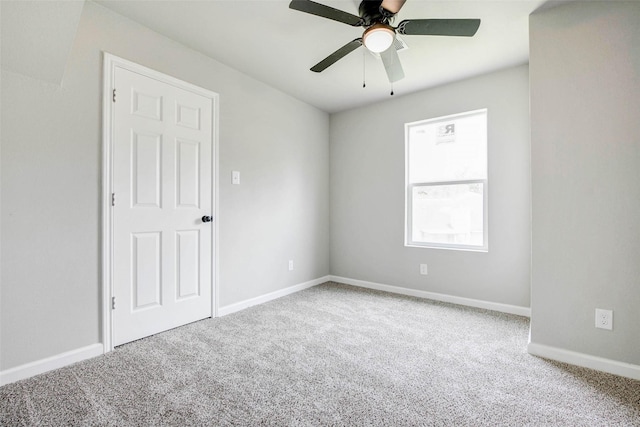12102 Benmore Dr, Houston, TX 77099 - carpeted spare room featuring ceiling fan and baseboards