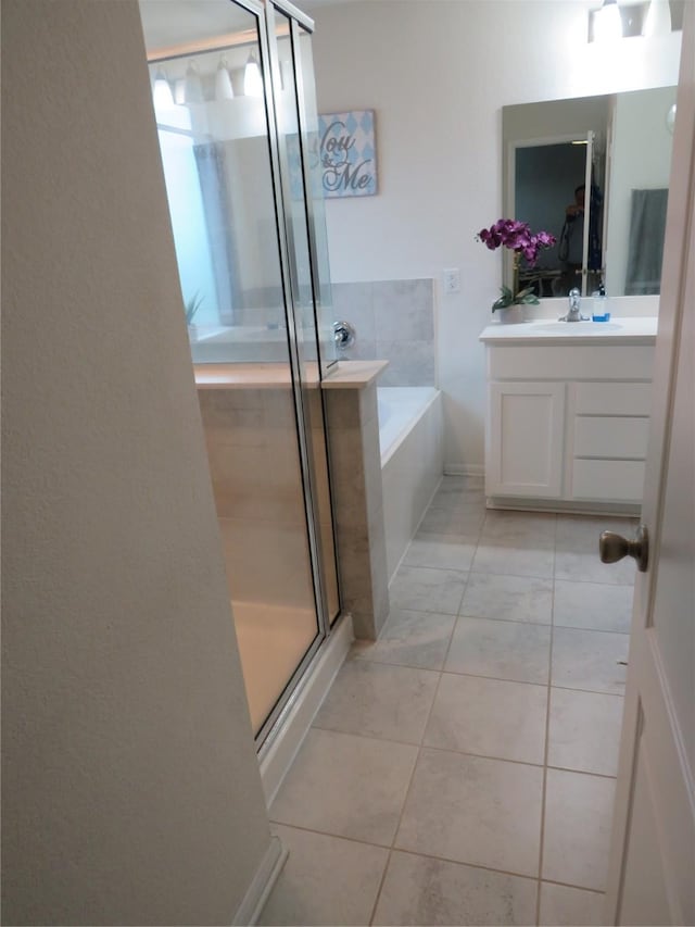 5218 Stone Castle Tower St, Katy, TX 77493 - bathroom featuring vanity, a stall shower, and a bath
