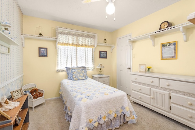 4818 Lost Lake Ln, Spring, TX 77388 - bedroom featuring light carpet, a ceiling fan, and wallpapered walls