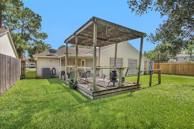 4818 Lost Lake Ln, Spring, TX 77388 - rear view of house featuring a pergola, a wooden deck, a shed, and a fenced backyard