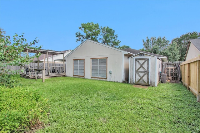 4818 Lost Lake Ln, Spring, TX 77388 - rear view of house with a storage shed and a fenced backyard