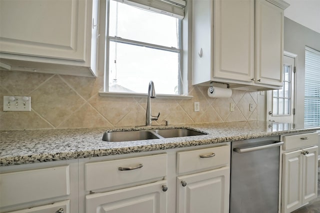 21326 Pebble Pine Trl, Cypress, TX 77433 - kitchen featuring dishwasher, backsplash, white cabinets, and light stone countertops
