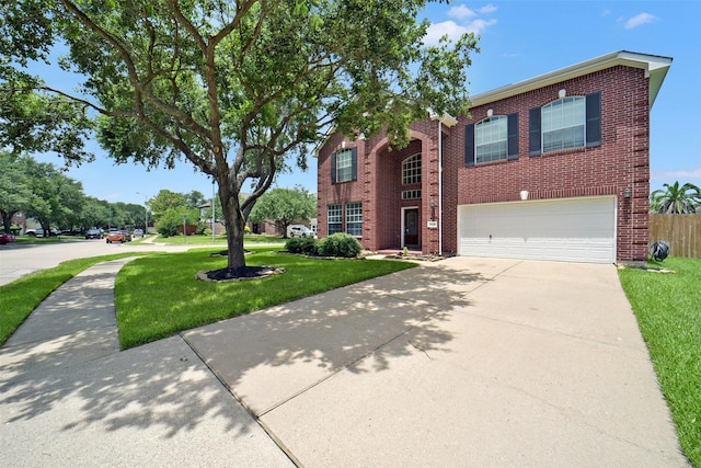 21326 Pebble Pine Trl, Cypress, TX 77433 - traditional-style house featuring brick siding, a garage, and concrete driveway