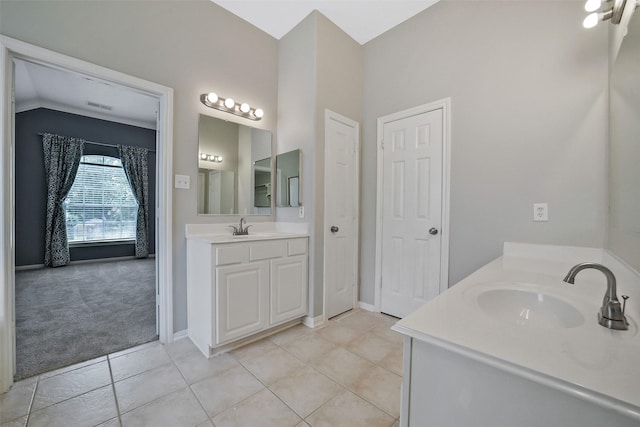21326 Pebble Pine Trl, Cypress, TX 77433 - bathroom with two vanities and tile patterned floors