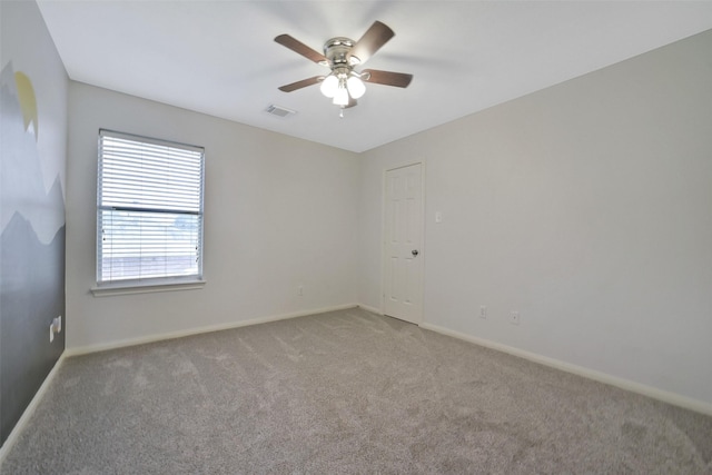 21326 Pebble Pine Trl, Cypress, TX 77433 - spare room featuring light carpet and a ceiling fan