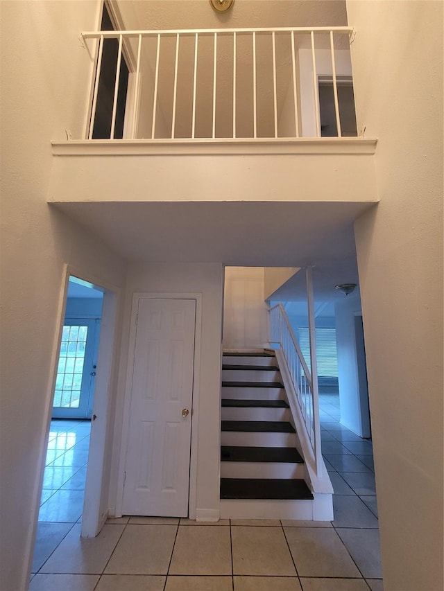 13930 New Village Ln, Sugar Land, TX 77498 - stairway with tile patterned floors