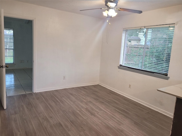 13930 New Village Ln, Sugar Land, TX 77498 - empty room featuring wood finished floors and a ceiling fan