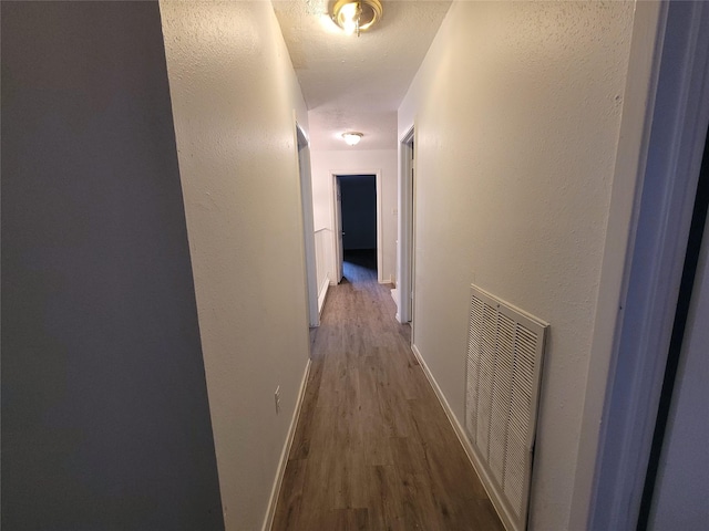 13930 New Village Ln, Sugar Land, TX 77498 - corridor with wood finished floors and baseboards
