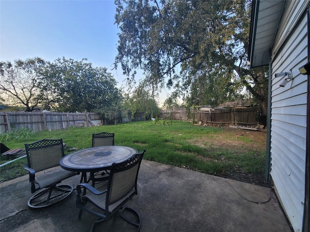 13930 New Village Ln, Sugar Land, TX 77498 - fenced backyard with a patio area and outdoor dining space