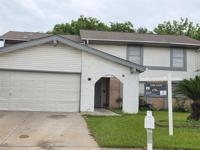 13930 New Village Ln, Sugar Land, TX 77498 - view of front facade with concrete driveway, a front lawn, an attached garage, stucco siding, and roof with shingles