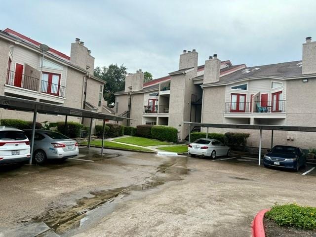 10855 Meadowglen Ln Unit 904, Houston, TX 77042 - view of covered parking lot