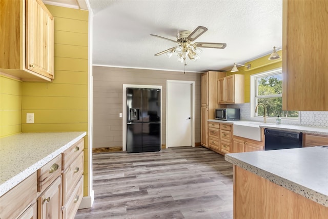 456 Cheatham Rd, Huffman, TX 77336 - kitchen with black appliances, a ceiling fan, backsplash, light wood-style flooring, and light brown cabinetry