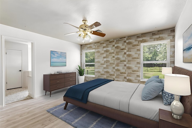 456 Cheatham Rd, Huffman, TX 77336 - bedroom with light wood finished floors and a ceiling fan