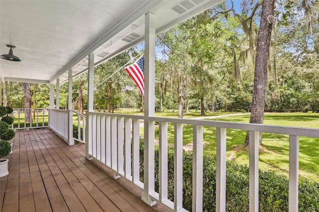 456 Cheatham Rd, Huffman, TX 77336 - porch featuring a yard and view of scattered trees