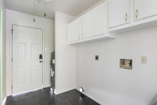 456 Cheatham Rd, Huffman, TX 77336 - laundry room with hookup for an electric dryer, cabinet space, washer hookup, dark tile patterned floors, and water heater