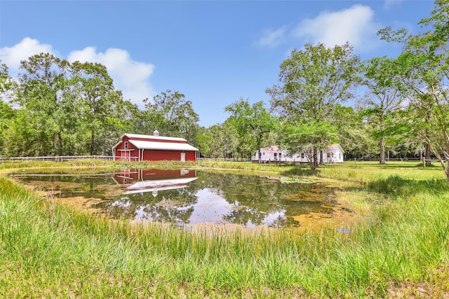 456 Cheatham Rd, Huffman, TX 77336 - view of yard with a water view and an outbuilding