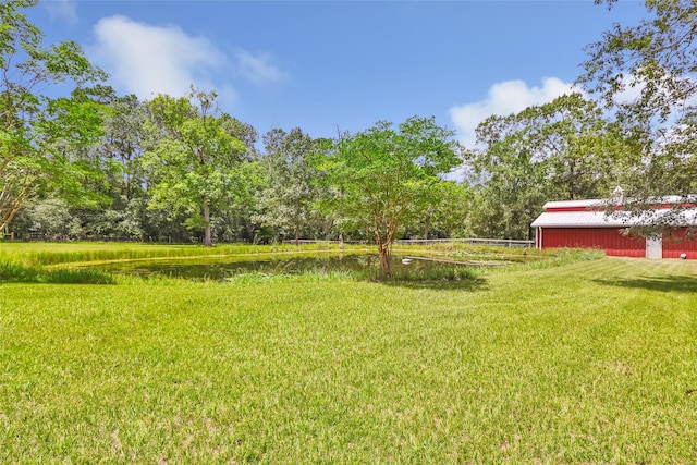 456 Cheatham Rd, Huffman, TX 77336 - view of grassy yard with an outbuilding