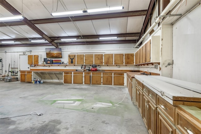 456 Cheatham Rd, Huffman, TX 77336 - garage with a workshop area