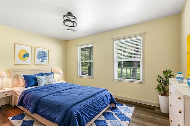 456 Cheatham Rd, Huffman, TX 77336 - bedroom with dark wood finished floors