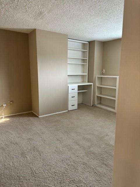 11522 Village Place Dr Unit 81, Houston, TX 77077 - unfurnished bedroom featuring light carpet and a textured ceiling