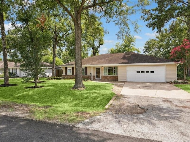 9327 Willowview Ln, Houston, TX 77080 - ranch-style home featuring concrete driveway, a garage, and a front yard