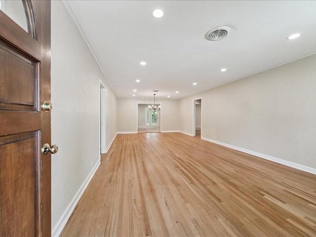 9327 Willowview Ln, Houston, TX 77080 - spare room with a chandelier, light wood-style floors, recessed lighting, and crown molding