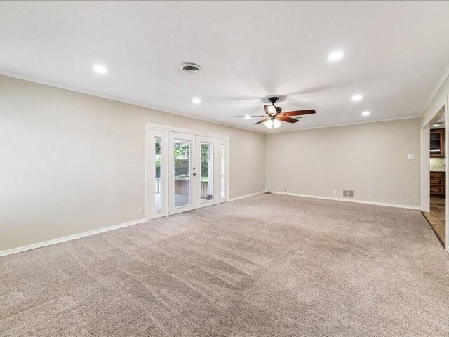 9327 Willowview Ln, Houston, TX 77080 - carpeted empty room with recessed lighting, a ceiling fan, ornamental molding, and french doors