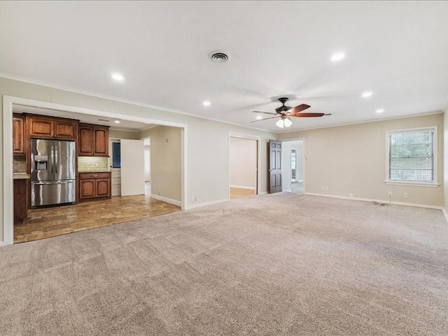 9327 Willowview Ln, Houston, TX 77080 - unfurnished living room featuring light carpet, ornamental molding, recessed lighting, and a ceiling fan