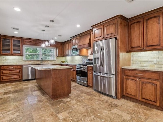 9327 Willowview Ln, Houston, TX 77080 - kitchen featuring appliances with stainless steel finishes, custom exhaust hood, tasteful backsplash, and recessed lighting