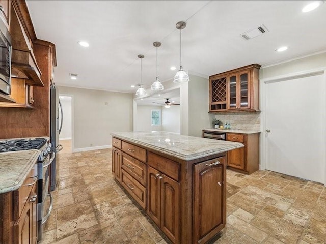 9327 Willowview Ln, Houston, TX 77080 - kitchen with appliances with stainless steel finishes, stone tile floors, a kitchen island, glass insert cabinets, and ceiling fan