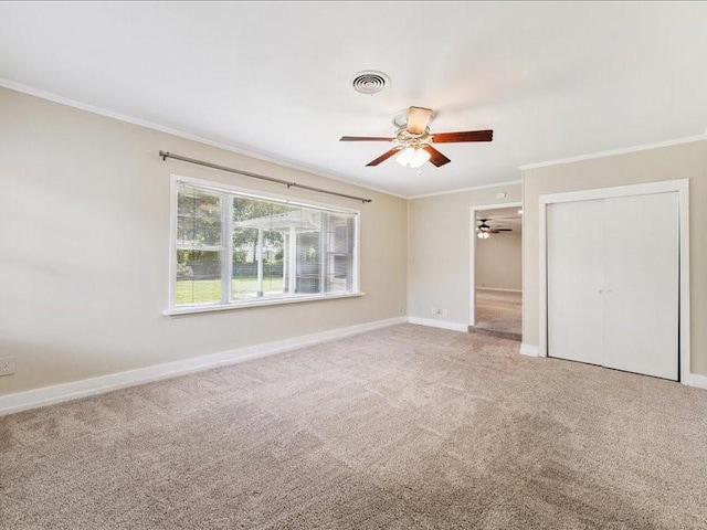 9327 Willowview Ln, Houston, TX 77080 - unfurnished bedroom with crown molding, carpet floors, a ceiling fan, and a closet