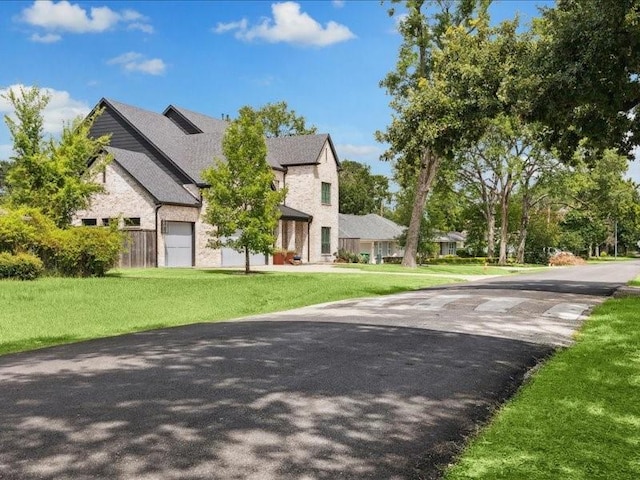 9327 Willowview Ln, Houston, TX 77080 - view of front facade with a front yard
