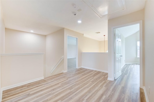 4202 Maurice Way, Stafford, TX 77477 - unfurnished room with attic access, light wood-style flooring, a smoke detector, and recessed lighting
