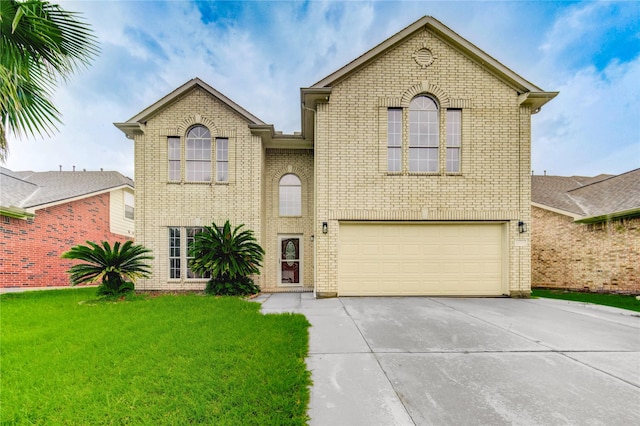 4202 Maurice Way, Stafford, TX 77477 - view of front of house featuring brick siding, a garage, driveway, and a front yard