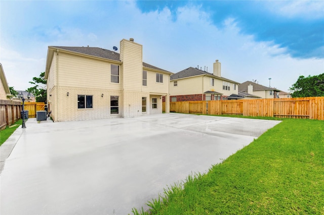 4202 Maurice Way, Stafford, TX 77477 - back of house featuring a patio area, a fenced backyard, brick siding, and a residential view