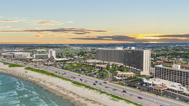 5220 Seawall Blvd Unit 1133C, Galveston, TX 77551 - aerial view at dusk of view of water and beach and a city view