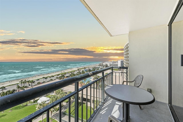 5220 Seawall Blvd Unit 1133C, Galveston, TX 77551 - balcony featuring view of water and beach