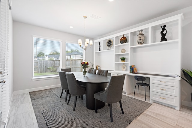 4710 Pecos Ridge Ln, Sugar Land, TX 77479 - dining area featuring a chandelier, built in study area, and recessed lighting