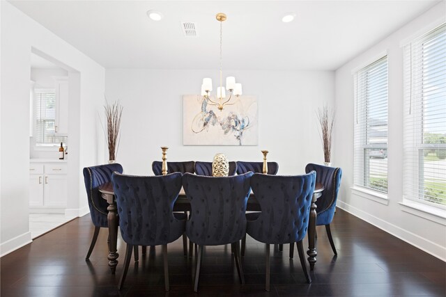 4710 Pecos Ridge Ln, Sugar Land, TX 77479 - dining room with a chandelier, healthy amount of natural light, wood finished floors, and recessed lighting