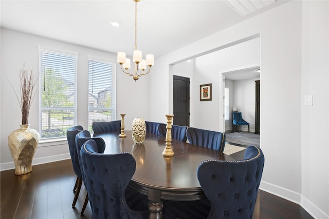 4710 Pecos Ridge Ln, Sugar Land, TX 77479 - dining space featuring a chandelier and wood finished floors