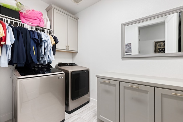 4710 Pecos Ridge Ln, Sugar Land, TX 77479 - laundry room with cabinet space and washer and dryer