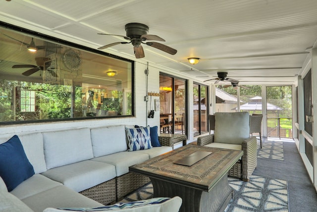 221 Kings Way, Coldspring, TX 77331 - sunroom / solarium with ceiling fan and outdoor lounge area