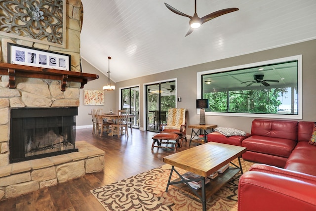 221 Kings Way, Coldspring, TX 77331 - living room with a ceiling fan, healthy amount of natural light, wood finished floors, a fireplace, and high vaulted ceiling